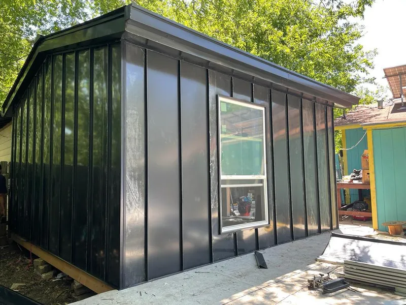 Black standing seam metal wall panels for Metal Roof Installation in Martha Lake