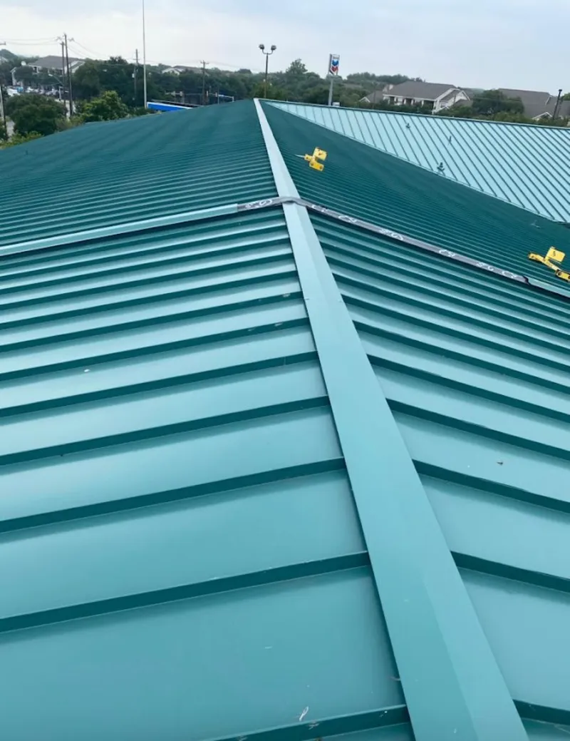 Green commercial metal roof ridge and valley for Metal Roof Repair in Martha Lake