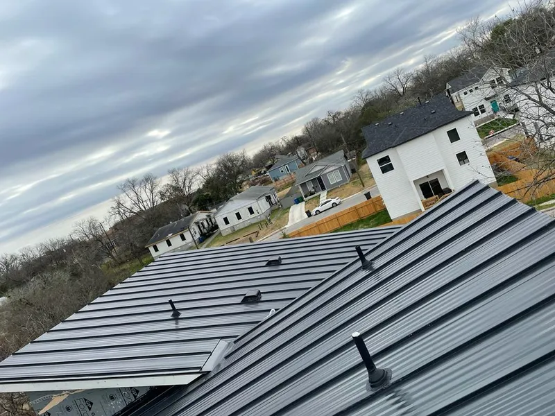 Standing seam metal roof panels with vents for Skylight Repair in Martha Lake